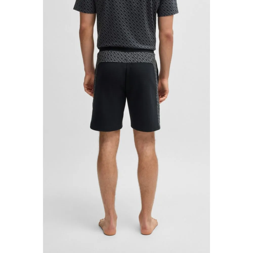 Shorts mit Monogramm-Muster-Einsätzen